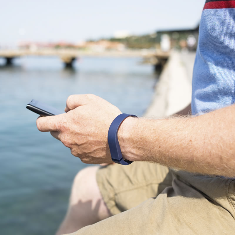 fitbit user on smart phone