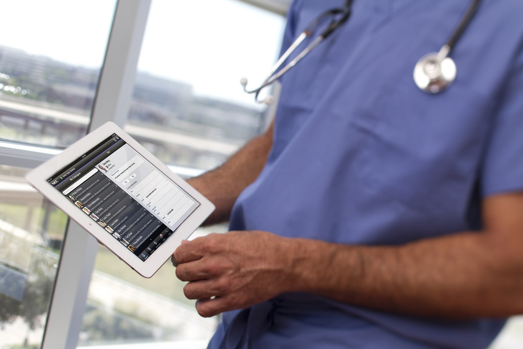 Doctor using ipad